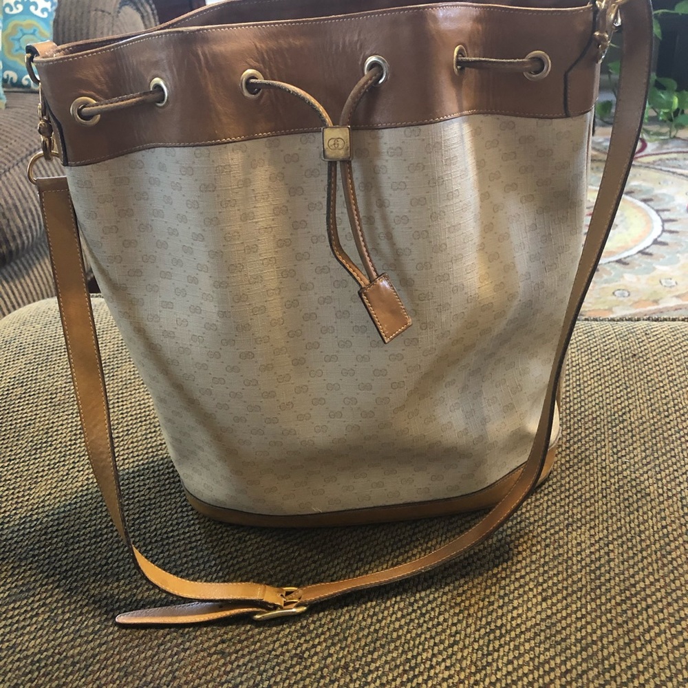 Gucci brown monogram leather bucket bag.Authentic